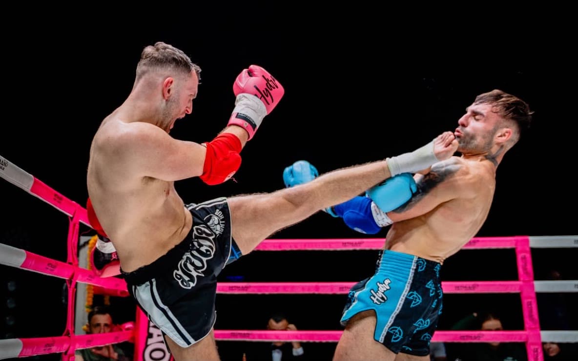 Hayden landing a head kick during a bout at the Hitman Fight League